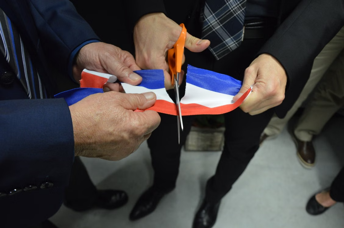 There is always a ribbon cutting. Photo credit: Ulrick Trappschuh via Pexels, free to use.